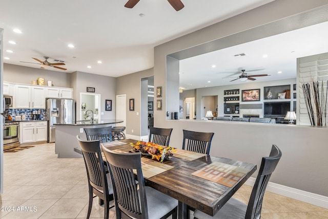 tiled dining area with sink