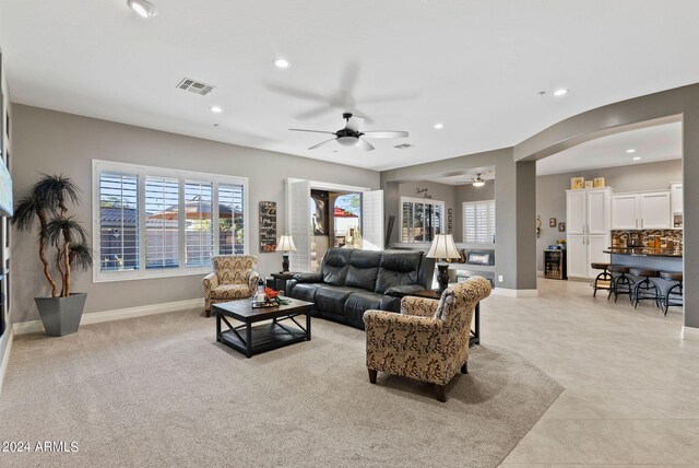 living room featuring ceiling fan