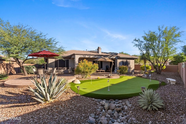 rear view of house featuring a patio area