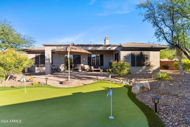 rear view of property with a patio