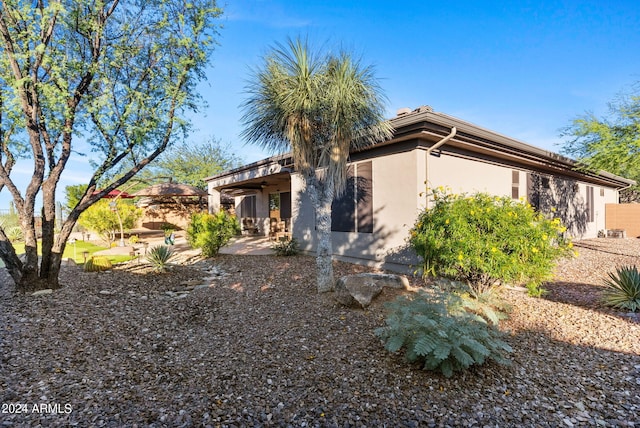 view of front of house with a patio