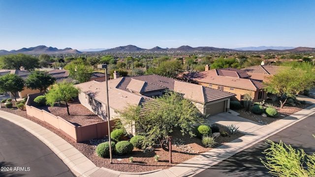 drone / aerial view featuring a mountain view