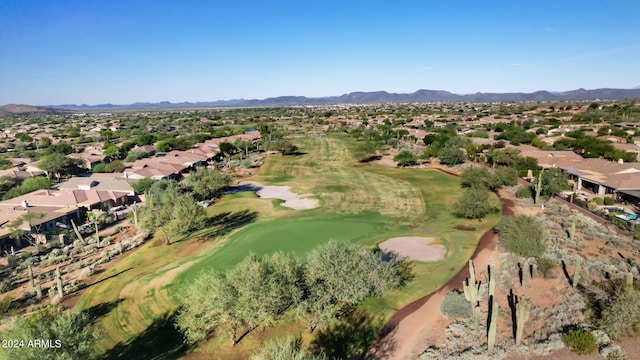 birds eye view of property featuring a mountain view