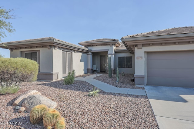 view of front of home with a garage