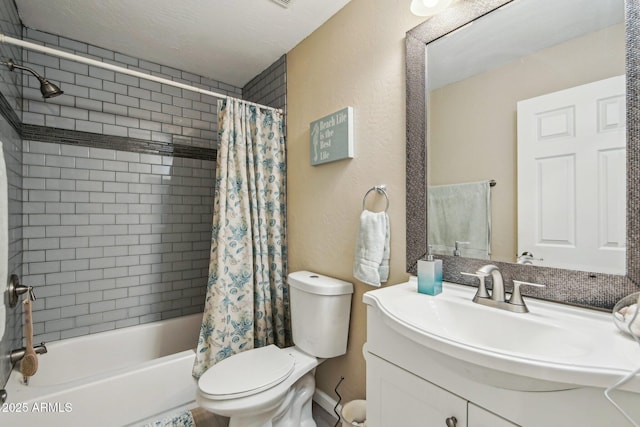 full bath featuring toilet, vanity, and shower / bath combo