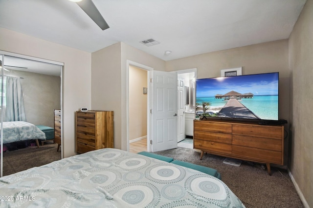 bedroom with carpet flooring, baseboards, ceiling fan, and visible vents