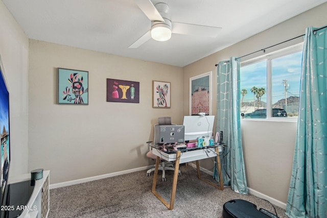 office with baseboards, carpet floors, and a ceiling fan