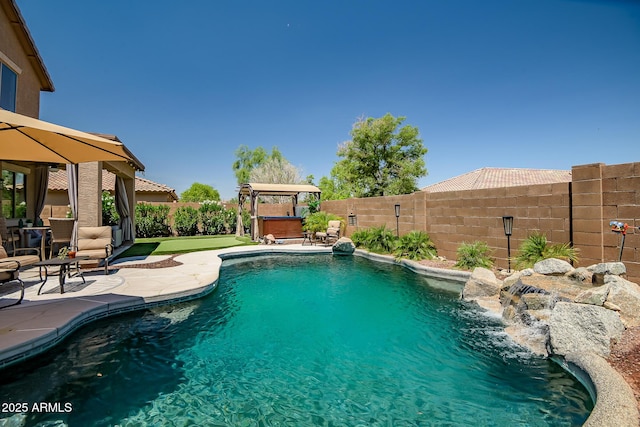 11936 W Alvarado Rd, Avondale, AZ 85392 - view of swimming pool with a gazebo, a hot tub, and a patio