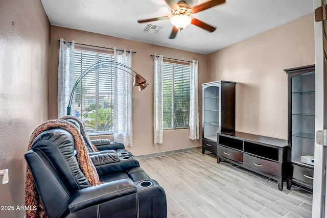 11936 W Alvarado Rd, Avondale, AZ 85392 - sitting room featuring ceiling fan and light wood-type flooring