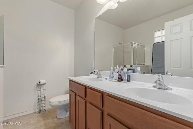 full bathroom featuring double vanity, tile patterned flooring, a shower stall, and a sink