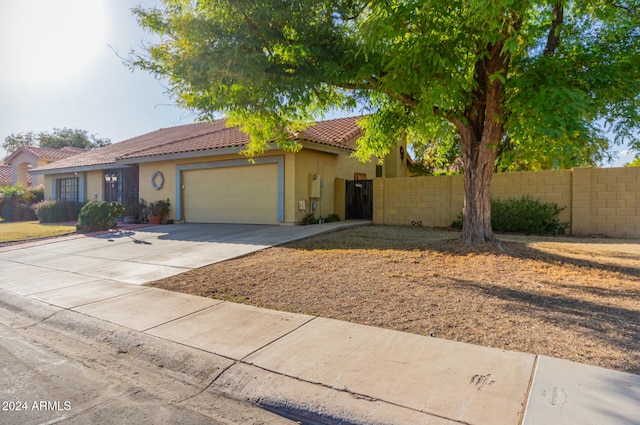 view of front of home with a garage