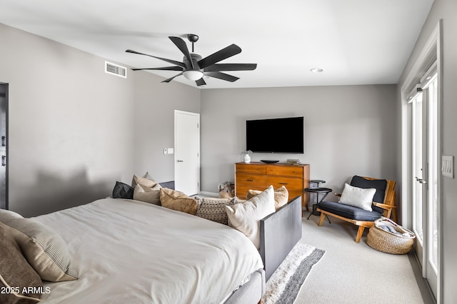 carpeted bedroom featuring ceiling fan