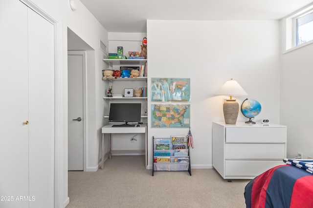 bedroom featuring light colored carpet