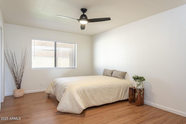 2925 E Dragoon Ave, Mesa, AZ 85204 - bedroom featuring wood finished floors and a ceiling fan