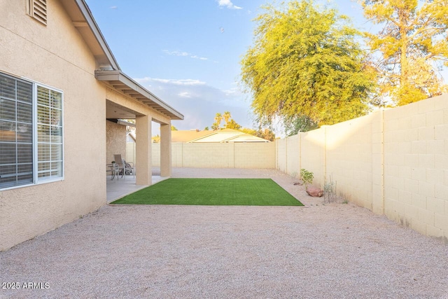 2925 E Dragoon Ave, Mesa, AZ 85204 - fenced backyard with a patio