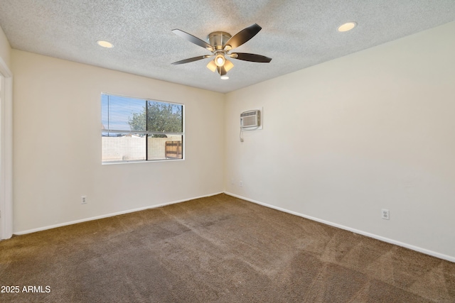 empty room with a wall unit AC, recessed lighting, ceiling fan, a textured ceiling, and carpet flooring