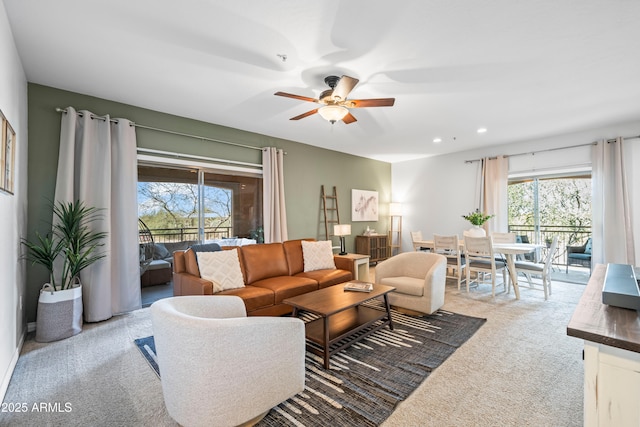 living room featuring recessed lighting, carpet floors, and ceiling fan