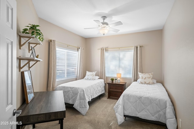 bedroom featuring ceiling fan and carpet floors