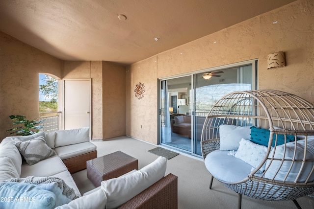 view of patio featuring an outdoor hangout area and a balcony