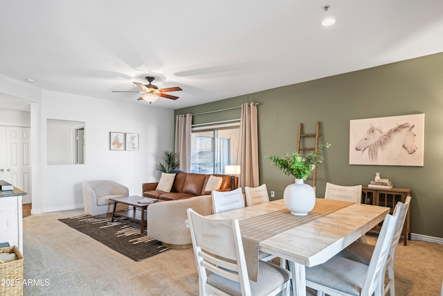 dining room with recessed lighting, a ceiling fan, baseboards, and light carpet