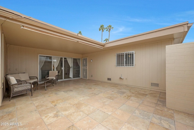 view of patio with visible vents