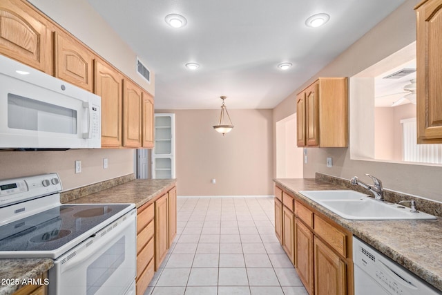 kitchen featuring pendant lighting, sink, white appliances, light tile patterned floors, and ceiling fan