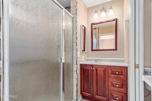 bathroom with vanity and an enclosed shower