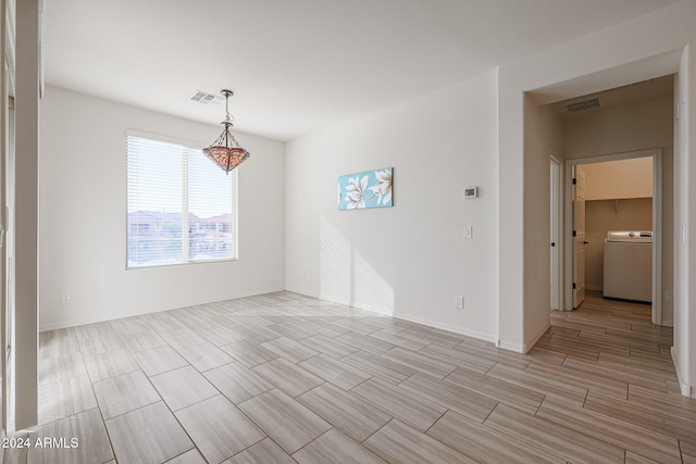 spare room featuring washer / clothes dryer