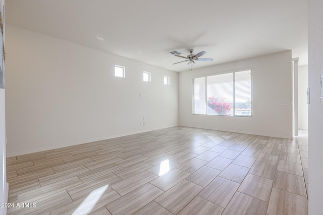 empty room featuring ceiling fan