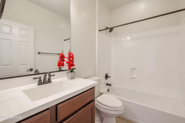 full bathroom with hardwood / wood-style floors, vanity, toilet, and bathing tub / shower combination