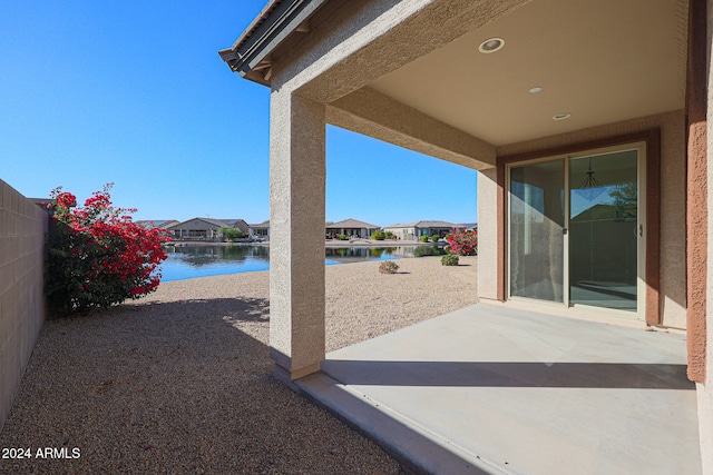 view of patio / terrace with a water view