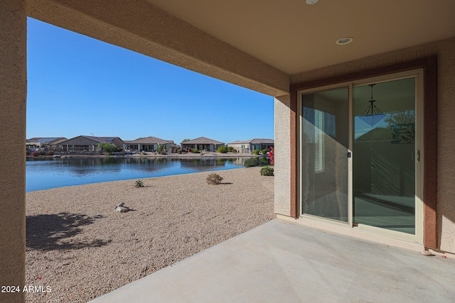 view of patio / terrace featuring a water view