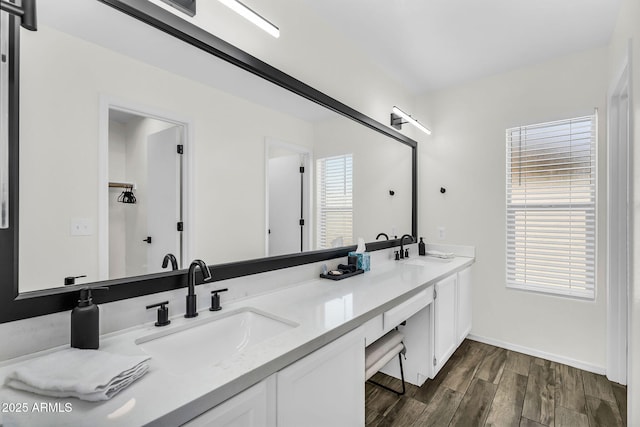 1320 E Scott Ave, Gilbert, AZ 85234 - full bathroom featuring double vanity, wood finished floors, and baseboards