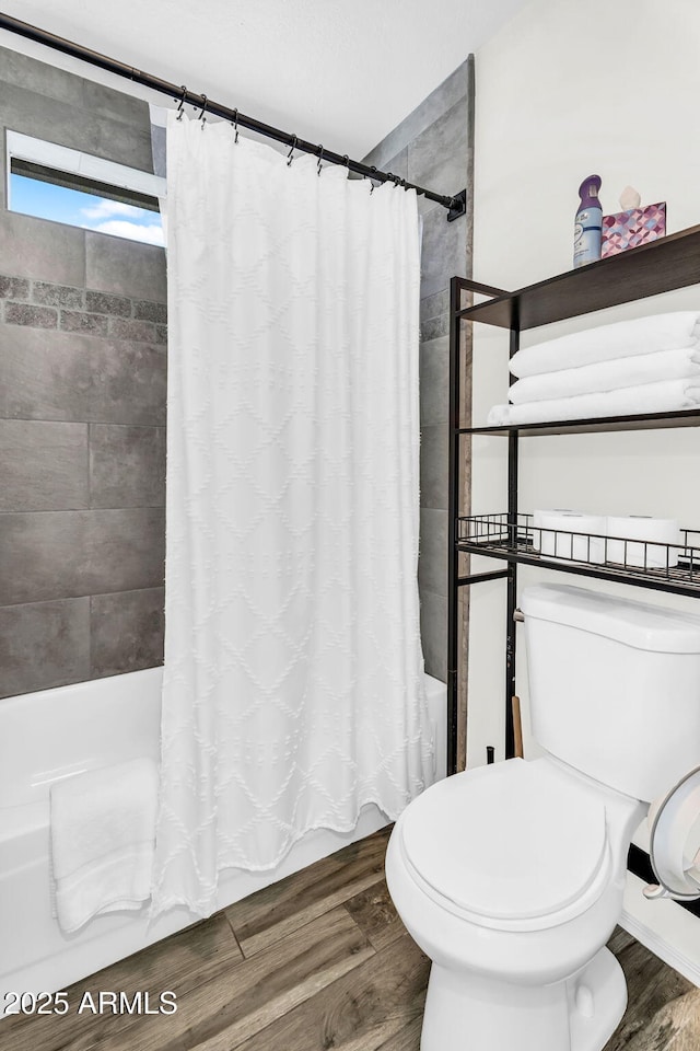 1320 E Scott Ave, Gilbert, AZ 85234 - bathroom featuring shower / bath combo, wood finished floors, and toilet