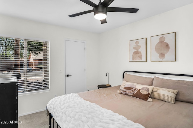 1320 E Scott Ave, Gilbert, AZ 85234 - carpeted bedroom with multiple windows, baseboards, and ceiling fan