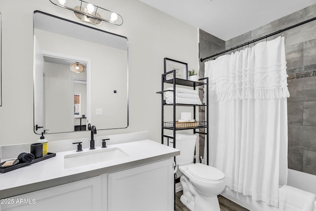 1320 E Scott Ave, Gilbert, AZ 85234 - full bathroom with vanity, toilet, shower / tub combo, and wood finished floors