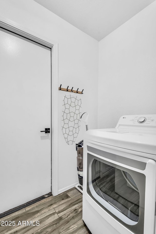 1320 E Scott Ave, Gilbert, AZ 85234 - laundry room featuring washer / dryer and wood finished floors
