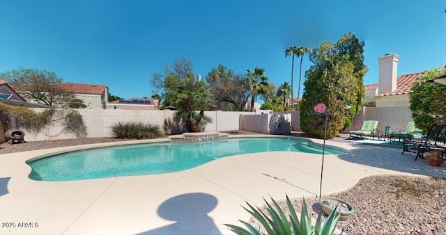 view of pool with a patio area, a fenced in pool, and a fenced backyard