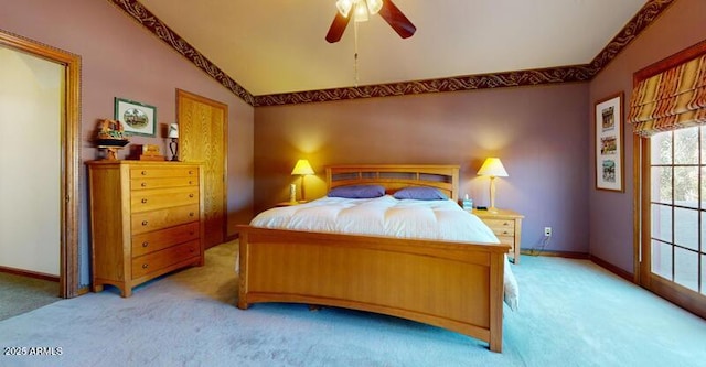 bedroom with ceiling fan, lofted ceiling, baseboards, and light carpet