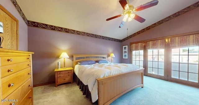 bedroom with light carpet, access to outside, a ceiling fan, and vaulted ceiling