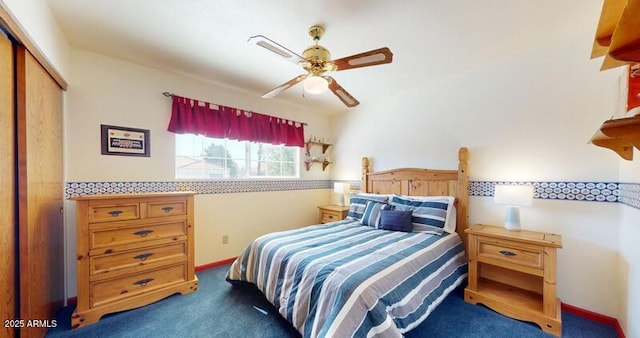 bedroom with a closet, carpet floors, baseboards, and ceiling fan