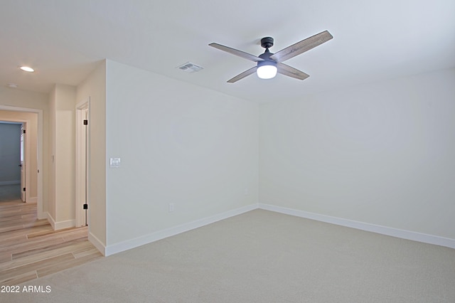 unfurnished room with light hardwood / wood-style floors and ceiling fan