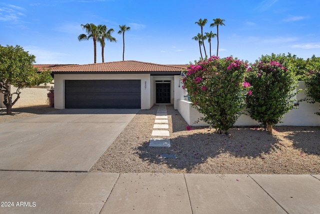 view of front of property featuring a garage