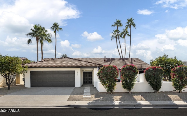 view of front of home with a garage