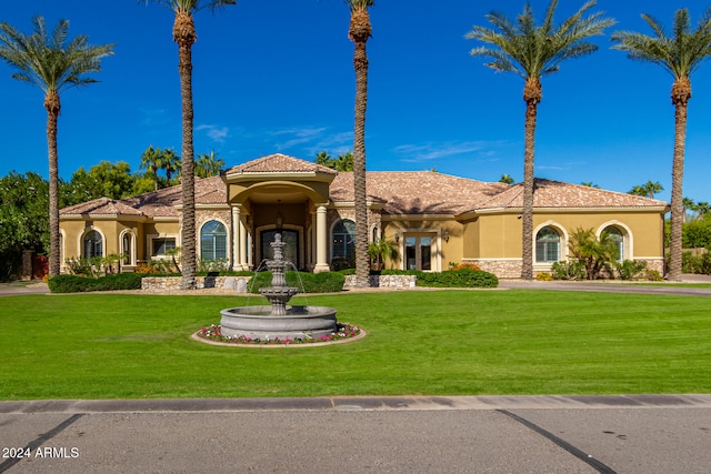 view of front of property featuring a front yard