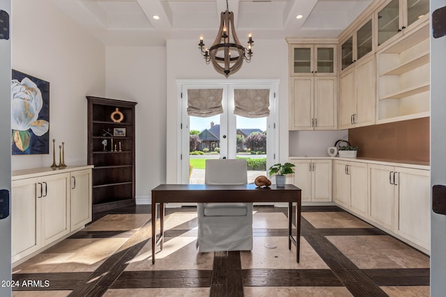 office space featuring beamed ceiling, an inviting chandelier, and french doors