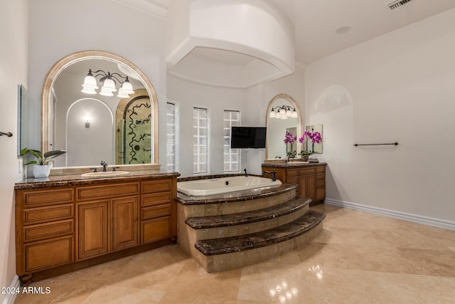 bathroom featuring vanity and a bathing tub