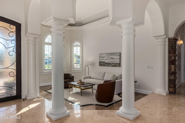 living room with a towering ceiling