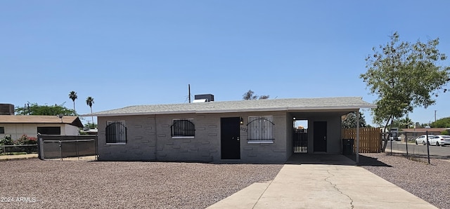 view of front of house featuring a carport