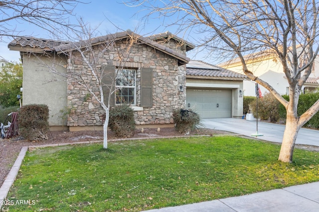 view of front of home featuring a garage and a front lawn